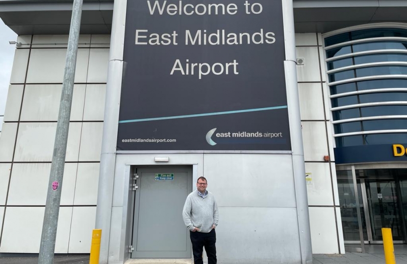 Mark Fletcher Outside the Sign for East Midlands Airport