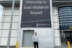 Mark Fletcher Outside the Sign for East Midlands Airport