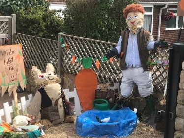 Scarecrow with orange hair at the festival