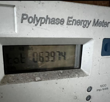 A close up of an electric meter